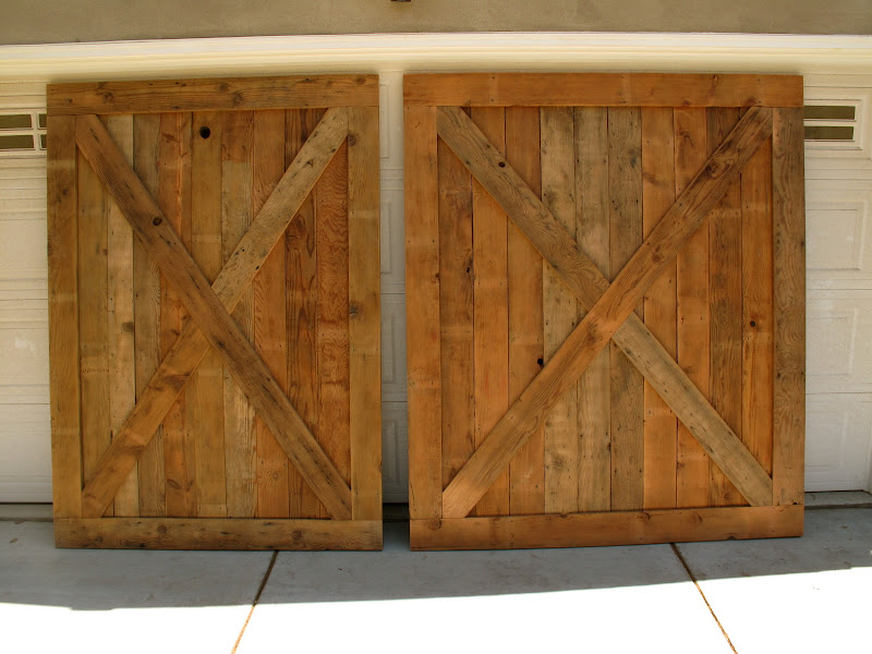 We finished these huge barnwood doors last week for a client in Long  title=