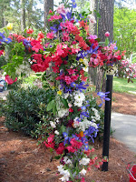 Cross shape covered with fresh flowers