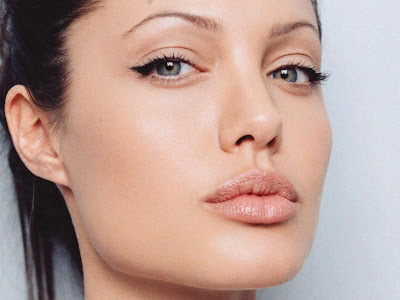 angelina jolie lips. Some women have big lips,