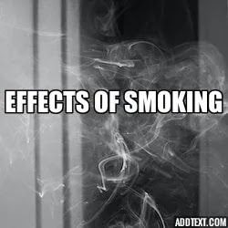 effects of smoking. Cigarette smoke floating in a dark room