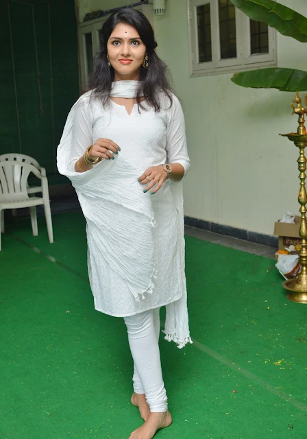Gayathri Suresh shines in white, exuding charm and grace in her latest cute stills.