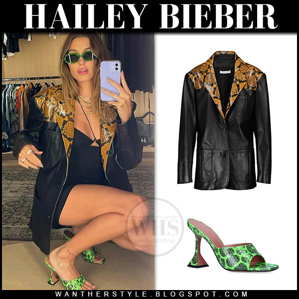 Hailey Bieber in black snakeskin print leather jacket and green sandals