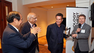 Bob Duggan, second from right, receives the 2016 Venky Award from Rod Alferness, dean of the College of Engineering at UC Santa Barbara. Duggan, a longtime Church of Scientology member, says he has given much more to church causes than the previously reported $360 million, and continues to do so. [ERIC ISAACS]