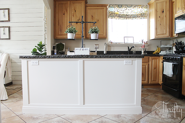 Board and batten kitchen island makeover. How to update your kitchen island. DIY kitchen island update. Two toned kitchen cabinets. White and wood kitchen cabinet ideas. Knotty alder kitchen cabinets.