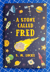 A Stone Called Fred by S.M.Locke Young Adult Fiction book cover showing cartoon space theme