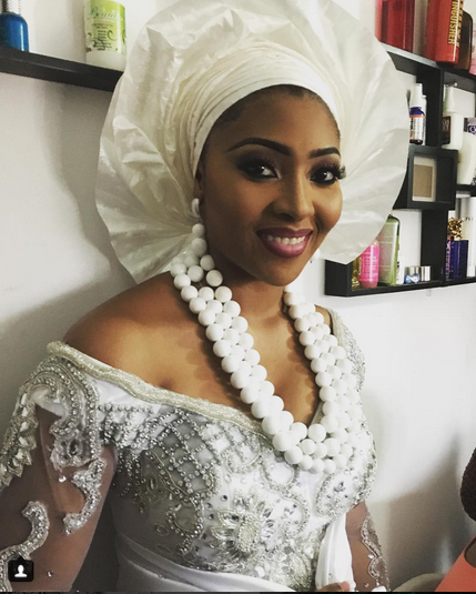 Photos from Lilian Esoro and Ubi Franklin's ongoing traditional wedding