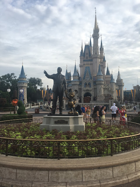 Partners Stature In Front of Cinderella Castle Disney World