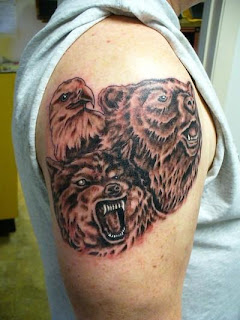 Wolf Tattoo on Arms with bear and eagle tattoo