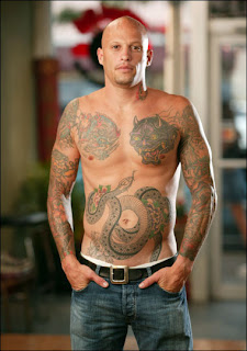 bow tattoos: Miami Ink Tattoos Designs