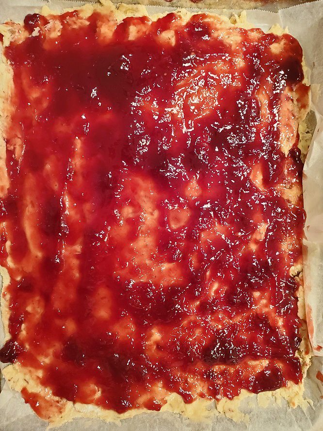 this is raspberry jam on a almond linzer crust