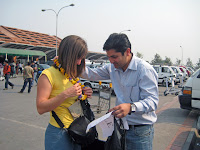 OHT's Raj offering a garland to a guest