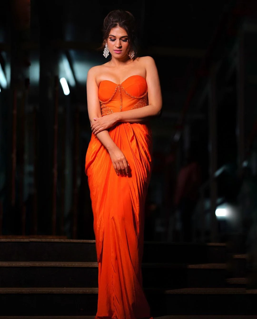 Shraddha Das cleavage orange dress