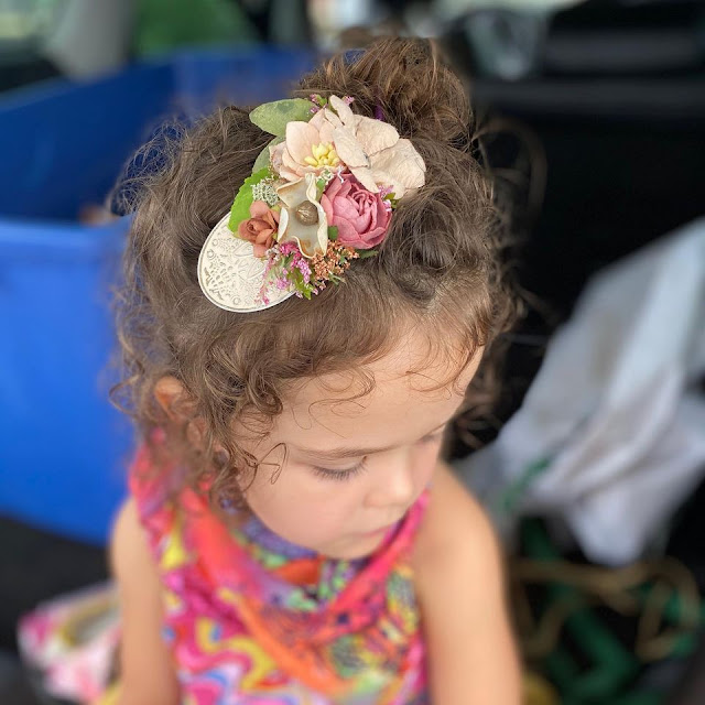 Little Lady Impressions' sweet hair pieces add a little magic.