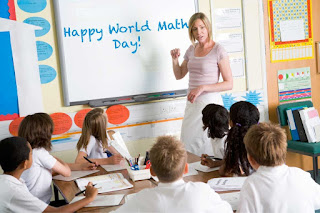 A teacher writing Happy World Maths Day 