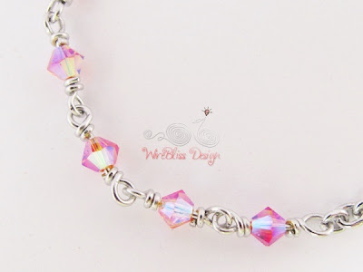 Close up of Wire wrapped minima bracelet (Minlet) with 4mm Pink Swarovski Crystals @WireBliss