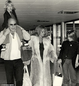 Telly Savalas and family at Heathrow Airport