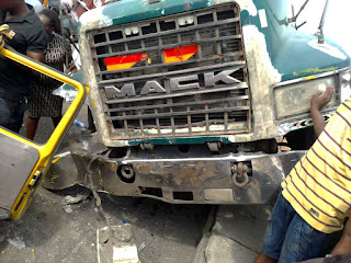 Accident involving an upturned 40ft container and a commercial bus at Cele express