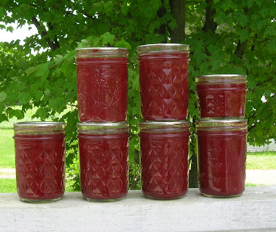 6 half pint and 1 4-oz jars of starwberry sauce