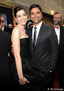 Anne Hathaway and John Stamos Image