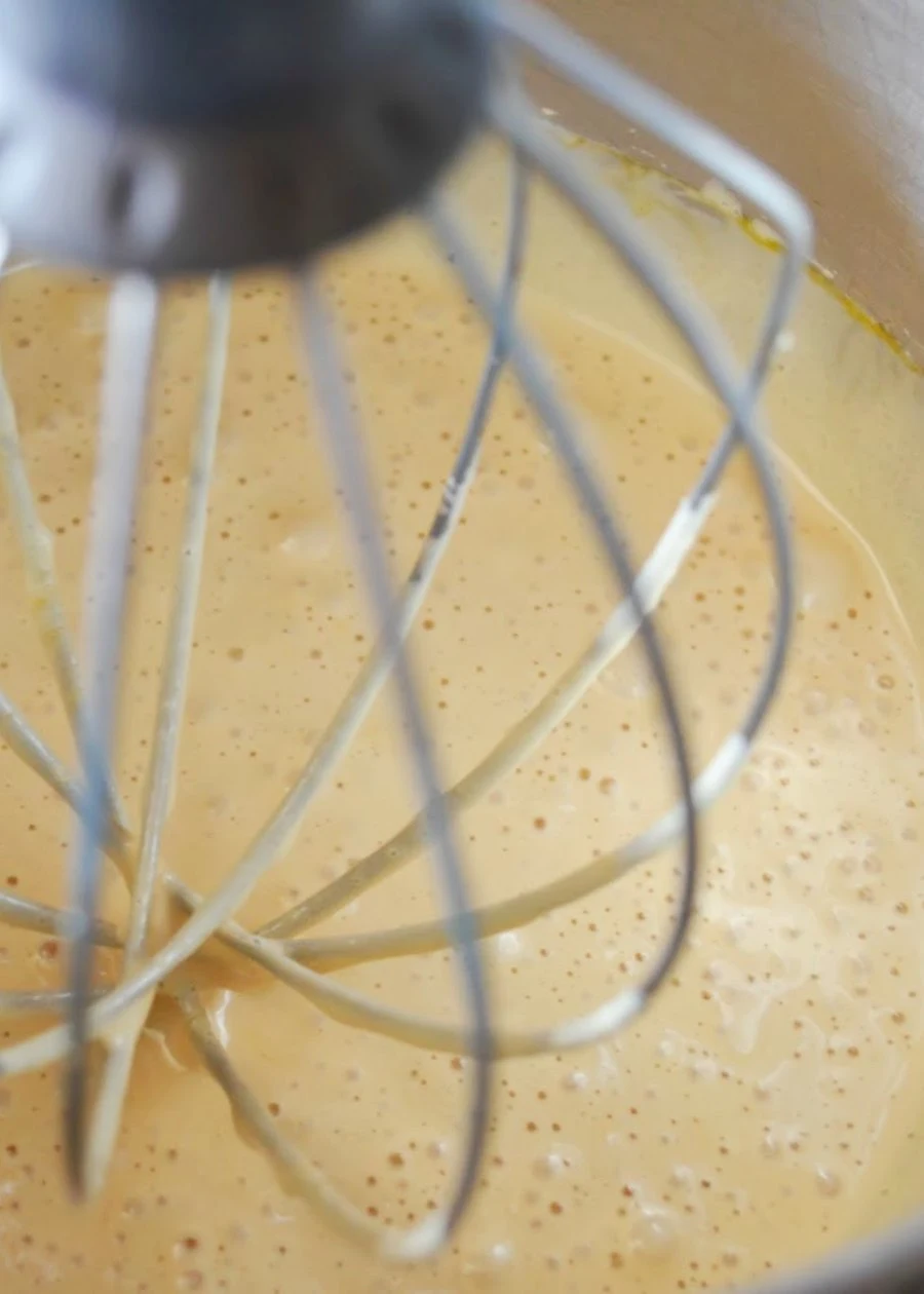 Eggs and sugar beaten to pale yellow for Creme De Menthe Brownies.