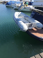 The new tender sitting on the Hurley H2O davits on the back ofMV  Destiny - an Elling E4