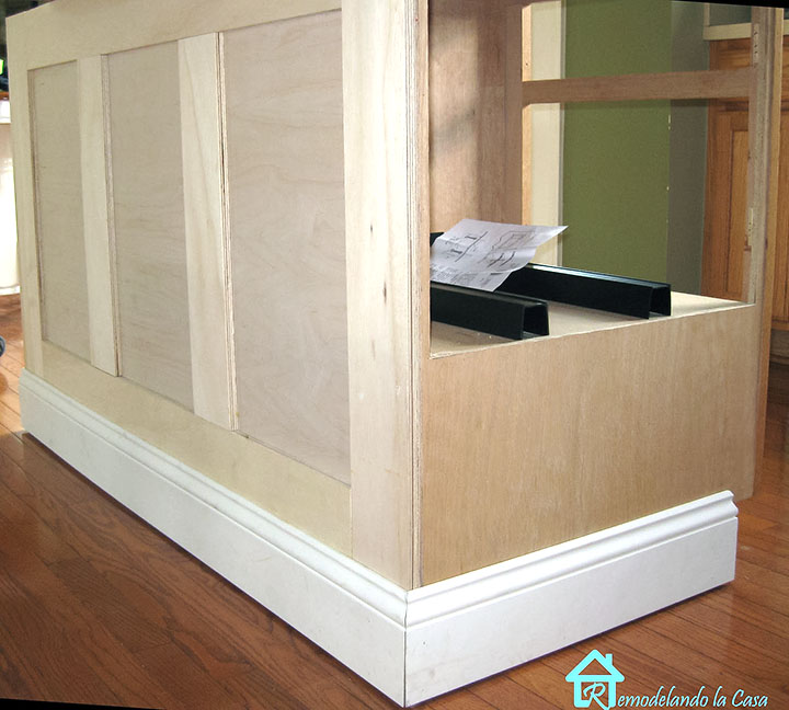 Board and batten on kitchen island plus microwave inside it