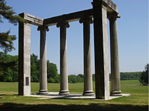 Ionic Colonnade and stone patio marking soldiers' graves. (image)