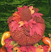 http://www.ravelry.com/patterns/library/large-crocheted-harvest-holiday-pumpkin