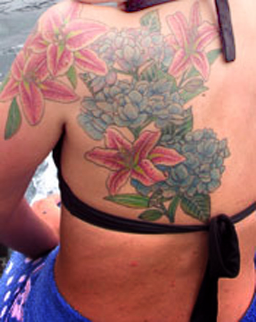 Red hawaiian flower tattoo designs for girls