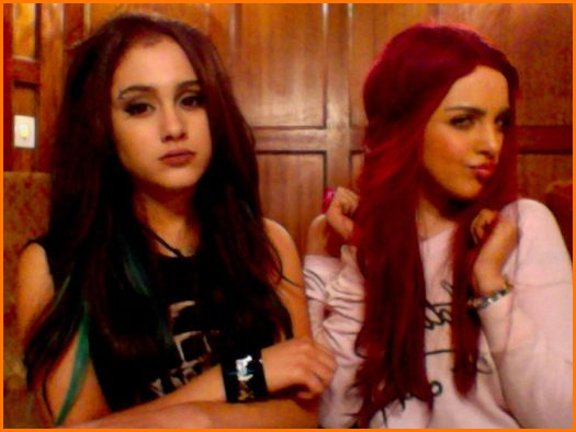 They both looked gorgeous Liz had red hair and Ariana style clothes and 