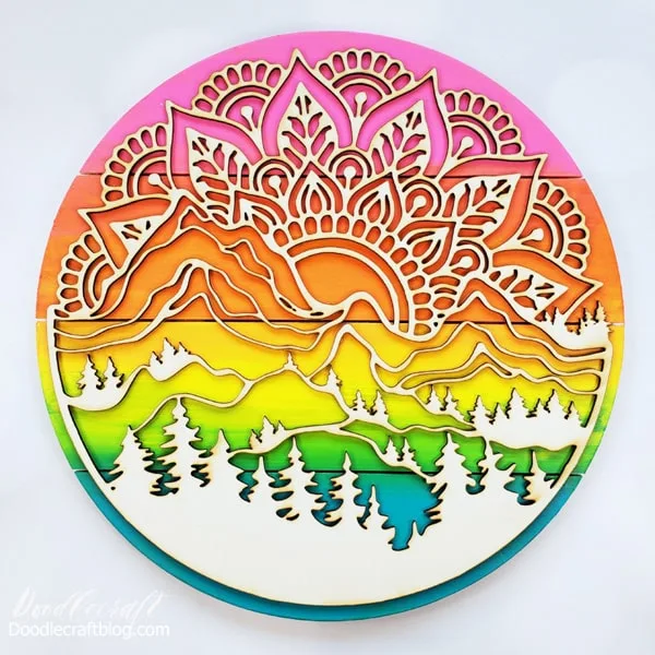 Then place the laser cut wood mandala on the sunset pallet, lining up the top and bottom.