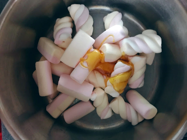 Marshmallows and golden syrup in a pan