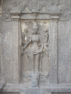 Durga- Featured on one side of the Trimurthi cave temple in Mahabalipuram India