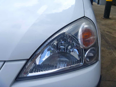 suzuki liana headlight