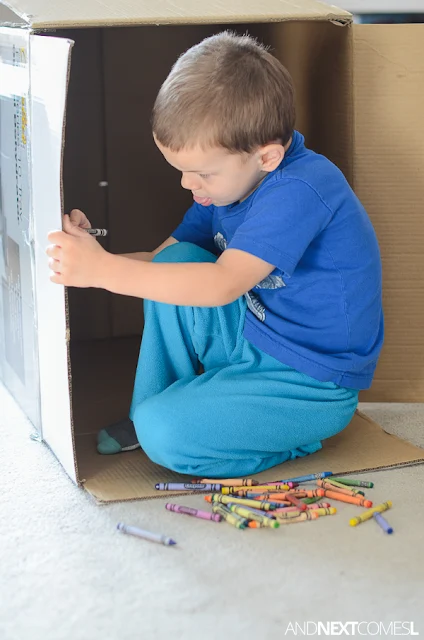 Drawing in a cardboard box - a perfect boredom buster process art idea for kids from And Next Comes L