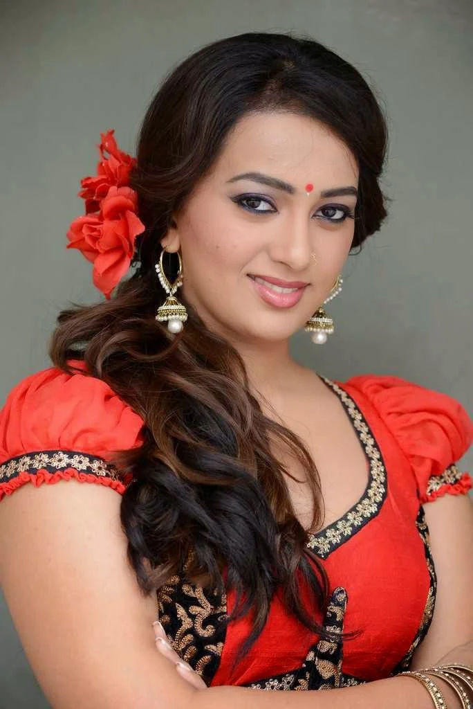 Ester Noronha Stills in Red Saree