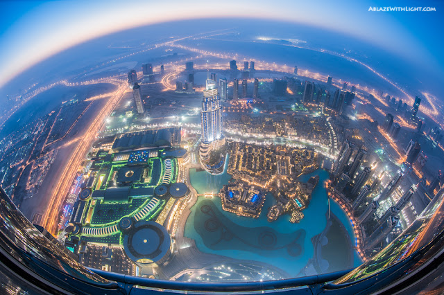 Photo of Dubai downtown at sunset as seen from the Burj Khalifa