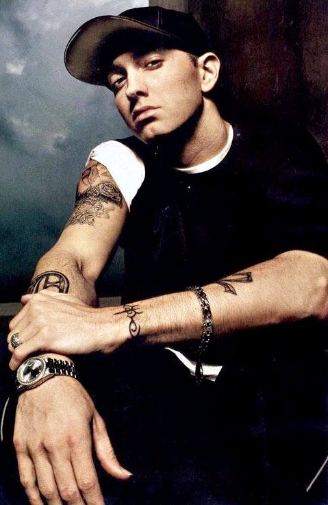 Eminem Hairstyles and Tattoo pictures