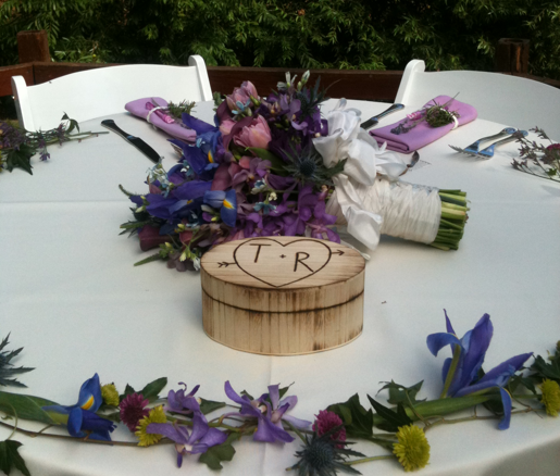 The family helped with sage and lavender decor a memorial table 