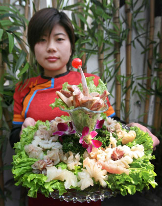 A platter of ox and dog penises. The consistency and taste remind one of overly bitter rings of calamari, apparently.  