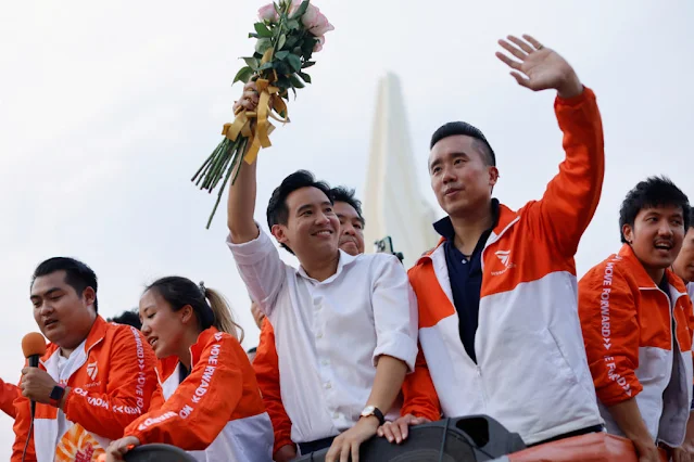 Image Attribute: Pita Limjaroenrat, the leader of the Move Forward Party and a candidate for the position of prime minister, expresses joy and celebrates the election results of the party in Bangkok, Thailand, on May 15, 2023. The photo was captured by Jorge Silva/REUTERS.