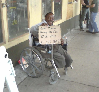 funny homeless sign kick in the face