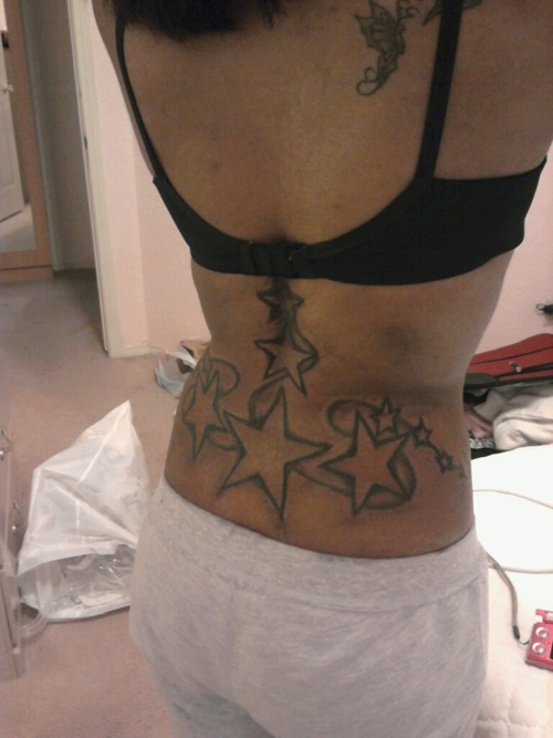 Women Star Lower Back Tattoos