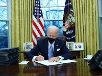 Biden sets to work on reversing Trump policies with executive orders.