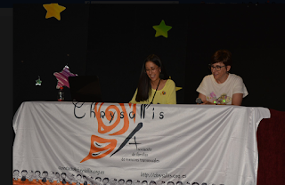 Foto tomada durante la charla coloquio a la mesa de la ponencia