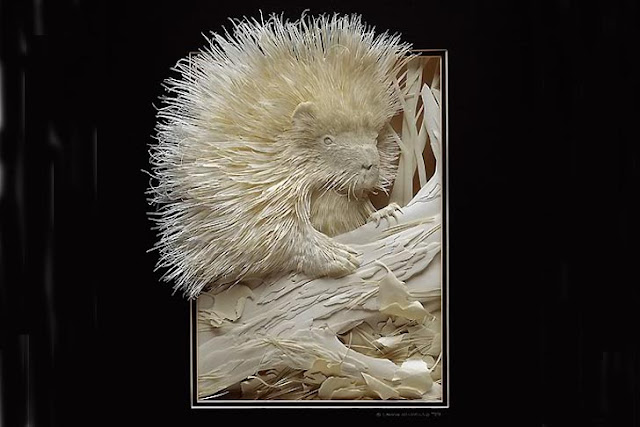 intricate wildlife paper sculpture 