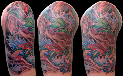 Half sleeve dragon tattoo
