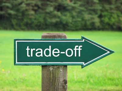 A posted sign reads "Trade-off"