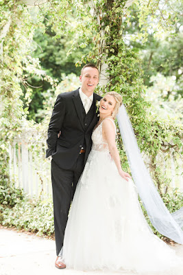 smiling bride and groom at lake mary events center