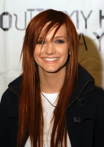 Ashlee Simpson bright auburn red hairstyle.